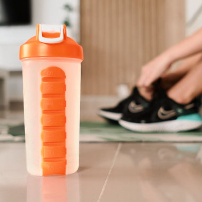 protein shaker water bottle with built in pillbox for vitamins supplements and prescriptions